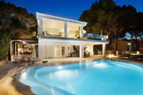 Villa white beach house, sobre la playa, aire acondicionado, wifi, piscina, lujo en Costa de la Calma